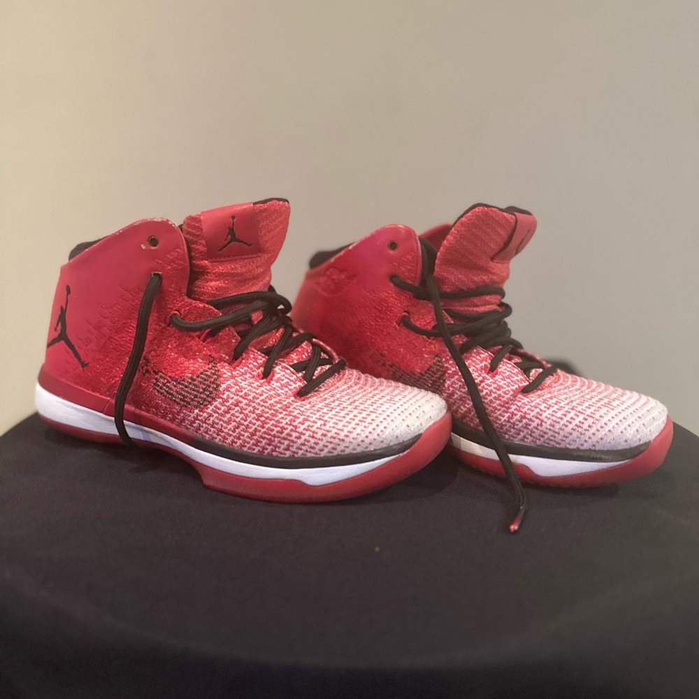 Air Jordan 31 Chicago Red and Black Performance Sneakers.